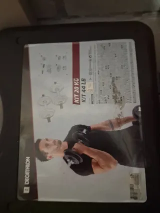 Pesas nuevas en maletín