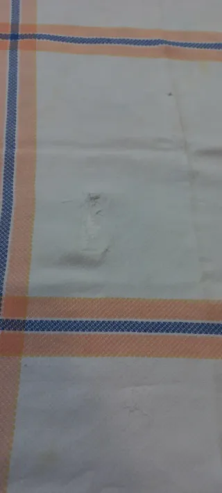 Mantel naranja y blanco a rayas