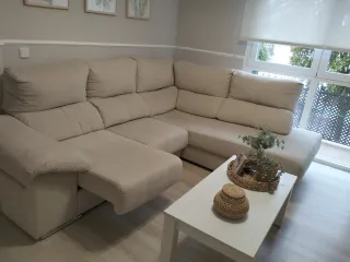 Sofá esquinero beige tela