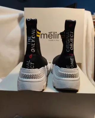 Botines Mēlinē Negros y Dorados