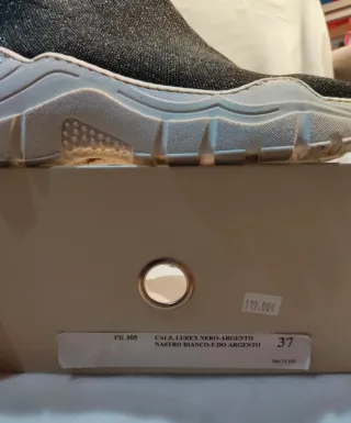 Botines Mēlinē Negros y Dorados