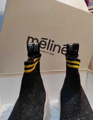 Botines Mēlinē Negros y Dorados