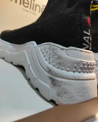 Botines Mēlinē Negros y Dorados