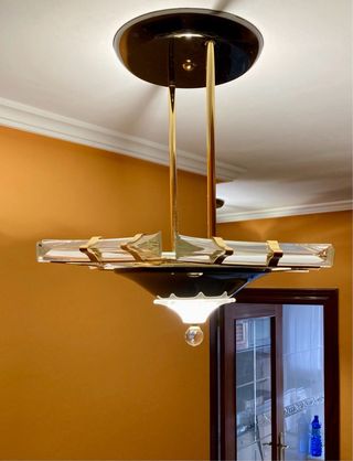 Lámparas de techo colgante de cristal y metal.