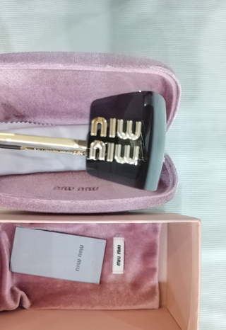 Gafas de sol Miu Miu MU54YS doradas