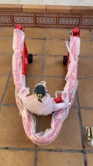 Caballete delantero moto