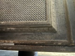 Estufa de leña antigua de fundición