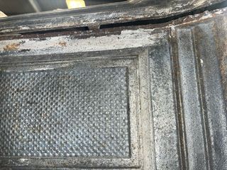 Estufa de leña antigua de fundición