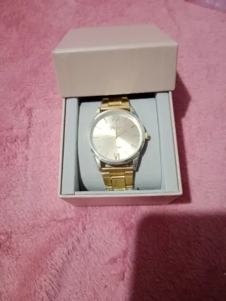 PRECIO NEGOCIABLE  Reloj de pulsera dorado y plate