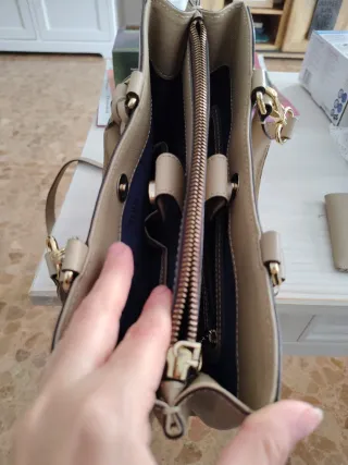 Bolso y cartera Tous piel beige y dorada