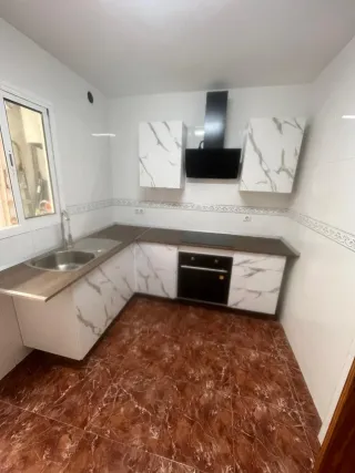 Cocina modular mármol y madera