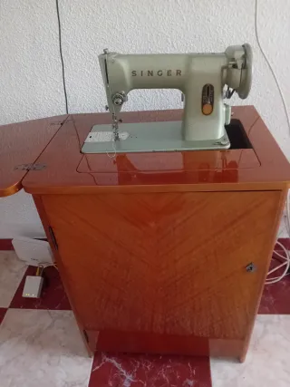Vendo maquina de coser Shinger