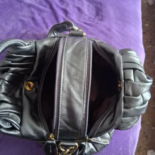 Bolso gris plateado nuevo.