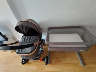 Cochecito de bebé y cuna con colchón