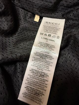 Chaqueta Gucci Negra con Capucha y Rayas