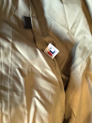 Piumino Fila smanicato grigio