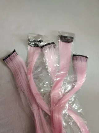 Extensiones rosa con clip.
