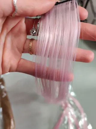 Extensiones rosa con clip.