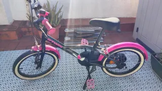Bicicleta infantil rosa y negra