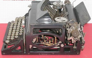 Máquina de escribir IDEAL antigua