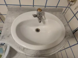 Lavabo de mármol y porcelana