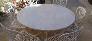 Mesa y 6 sillas de jardín