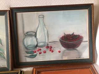 Cuadros y espejo decorativo