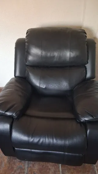 Sillón reclinable de piel negro