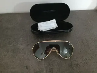 Occhiali da sole Ray-Ban neri e oro