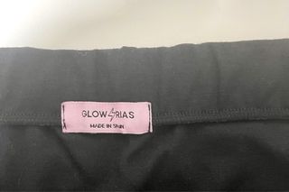 Falda Glowrias negra elástica con volante