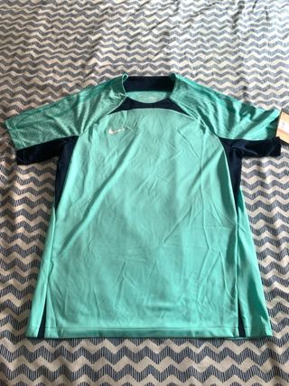 Camiseta técnica Nike turquesa hombre