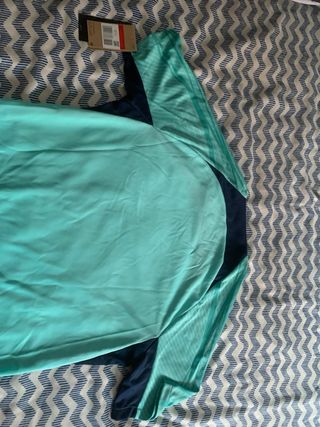 Camiseta técnica Nike turquesa hombre