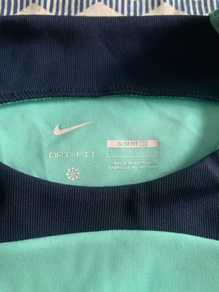 Camiseta técnica Nike turquesa hombre