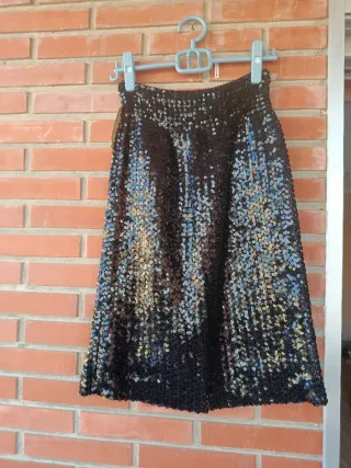 Falda lentejuelas negra.Nueva