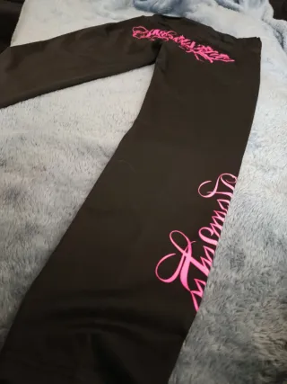 Mallas Newstyle negras con detalle rosa