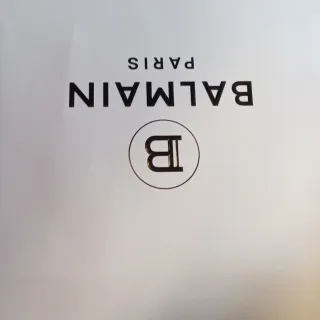 Tre sacchetti Balmain, Gucci, Jimmy Choo