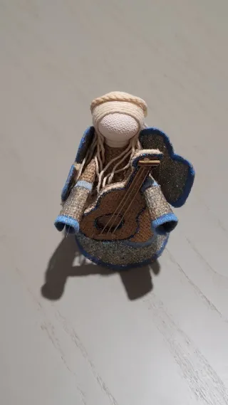 Jute angel decoration with guitar