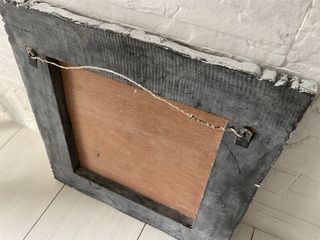 Specchio antico con cornice decorata