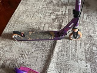 Due Monopattini Oxelo Viola e Rosa