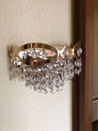 Lámparas de pared doradas con cristales