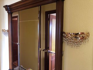 Lámparas de pared doradas con cristales