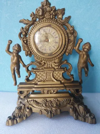 Orologio da tavolo con putti