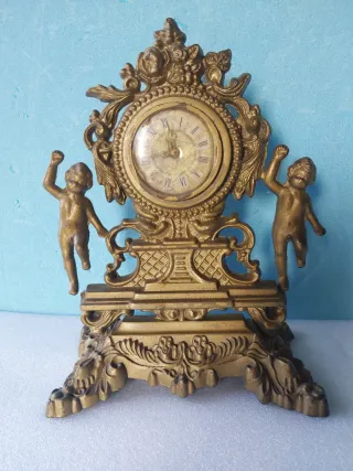 Orologio da tavolo con putti