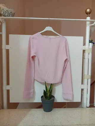 Chaleco rosa de manga larga