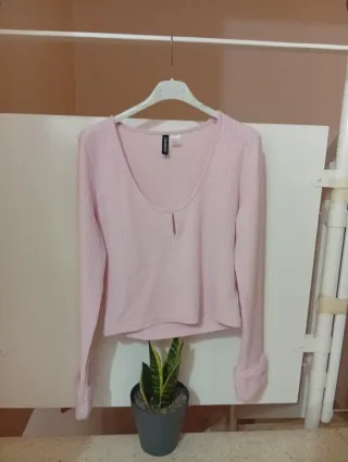 Chaleco rosa de manga larga