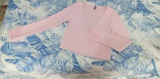 Chaleco rosa de manga larga