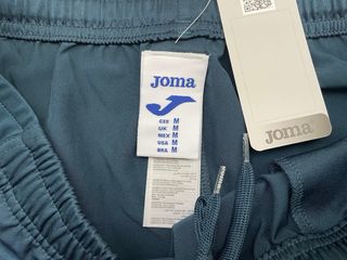 Pantalón corto deportivo Joma azul