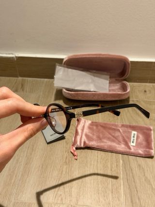 Occhiali da vista Miu Miu neri/marrone