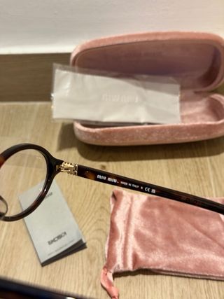 Occhiali da vista Miu Miu neri/marrone