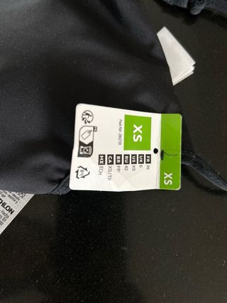 Top sportivo nero con banda TRAINING